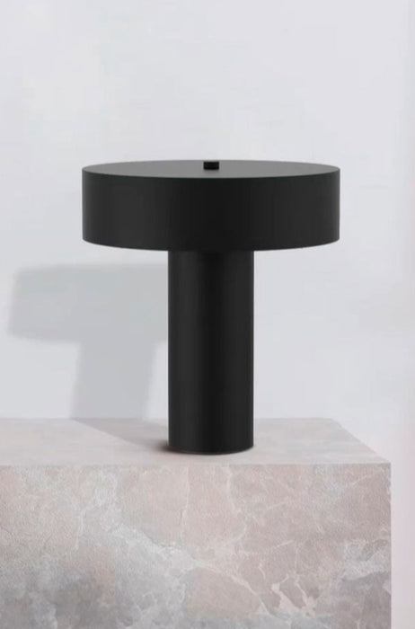 Table lamp over marble table