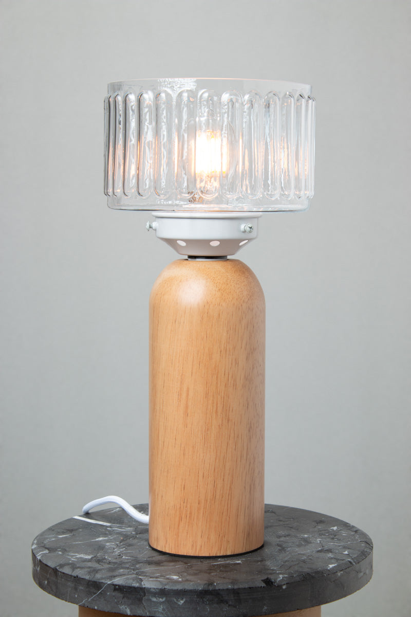 Capri Wood Table Lamp with clear vertically fluted glass shade and natural timber base