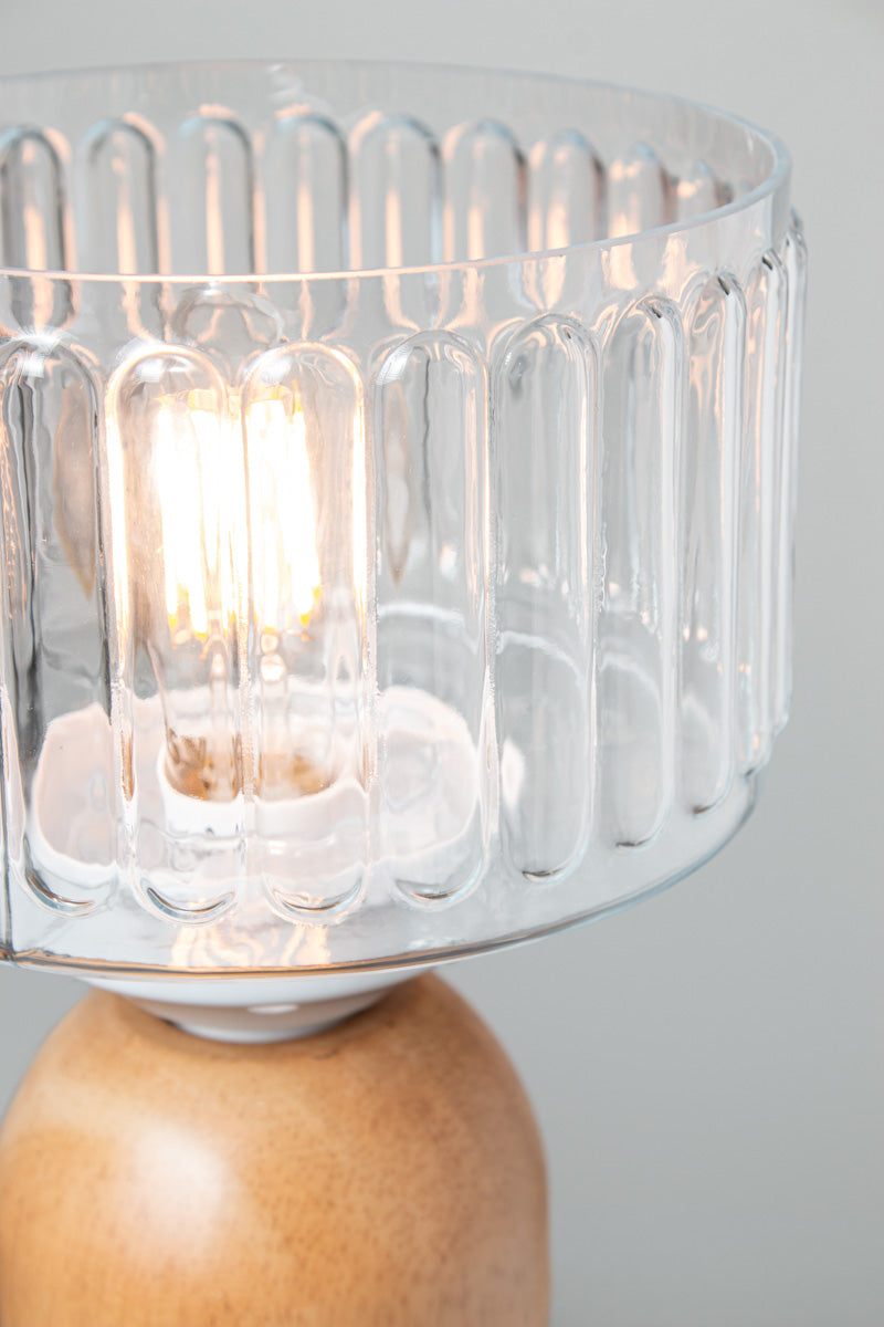 Close-up of Capri Wood Table Lamp showing clear fluted glass shade and white gallery