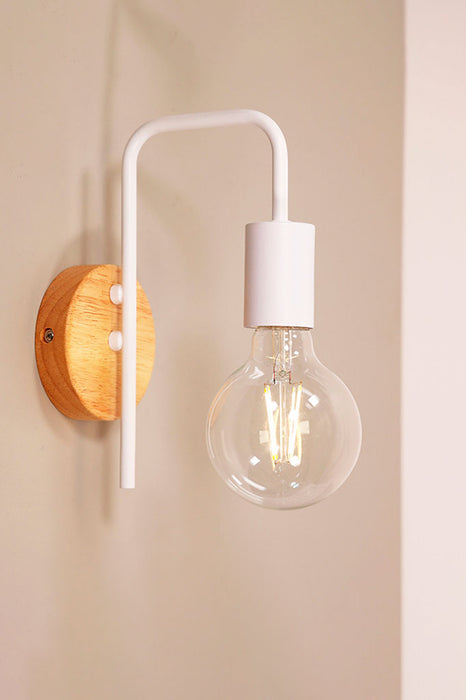 Timber wall light in white finish
