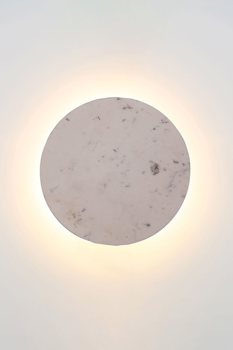 Small grey marble circular back-lit LED wall light. 