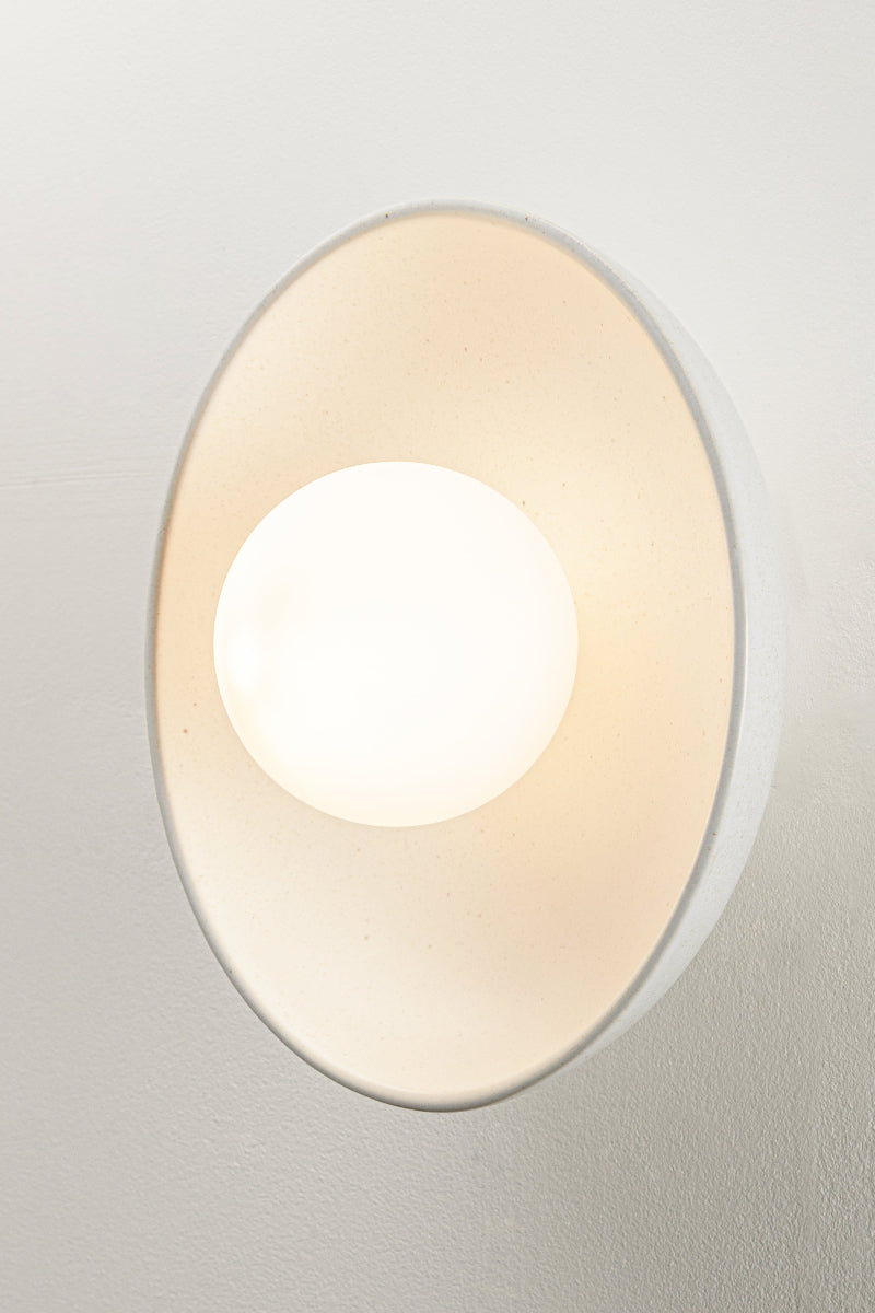 satin glazed ceramic shade with opal glass orb softens and diffuses light