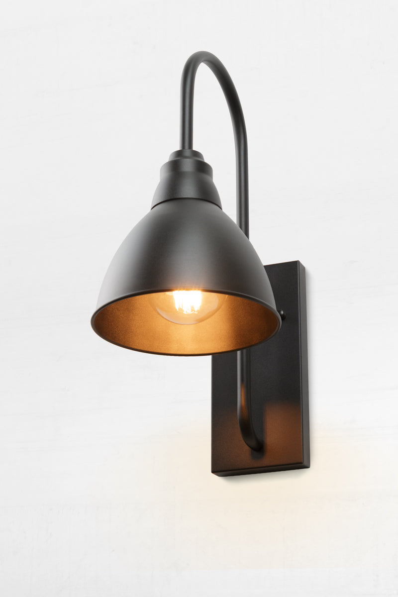 Large black wall light with goodsneck arm and dome shade. with clear round bulb. 