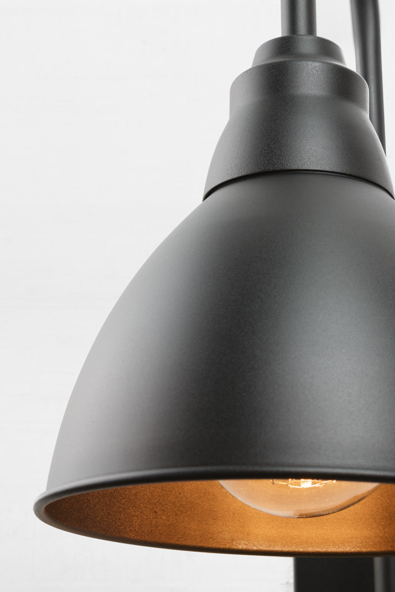 Close up of the large black dome shade. 