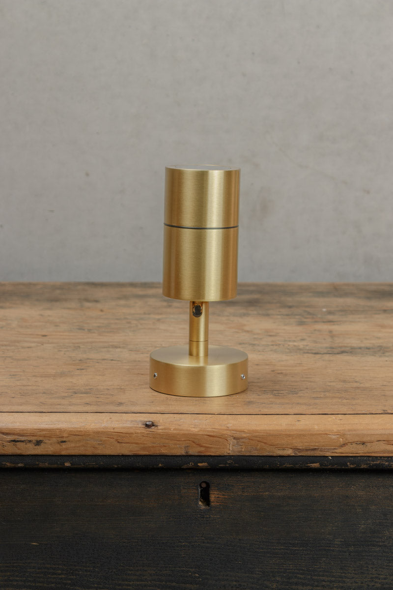 Uninstalled fully extendedn outdoor brass spotllight. 