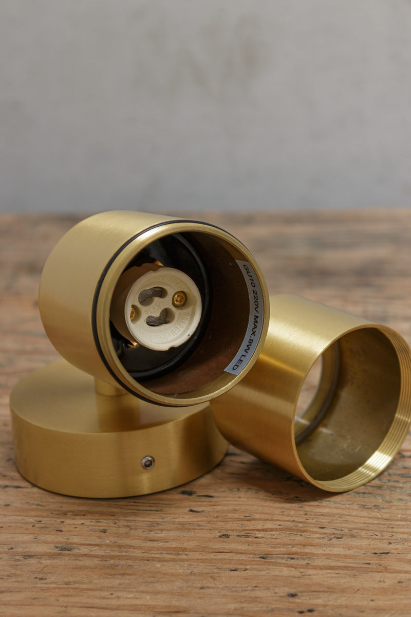 Dismantled image of the brass outdoor spotlight