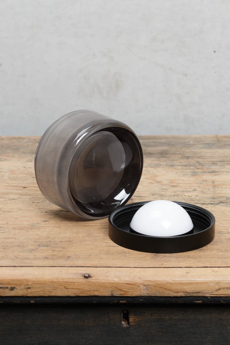 Grey glass shade and integrated LED wall sconce