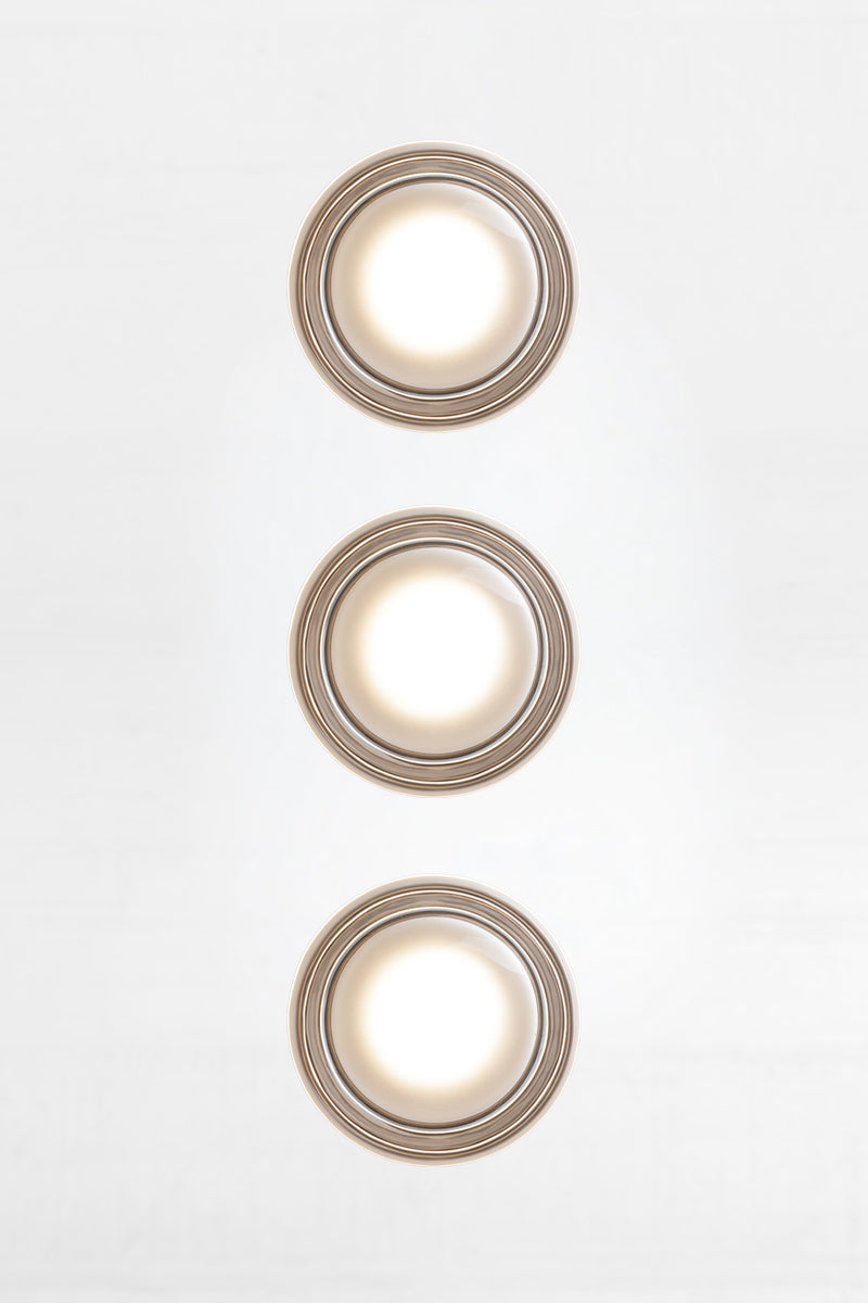 Triple frosted white Laval Dimple Glass LED Wall Sconce bundle with softly diffused LED lighting and minimalist circular wall mounts.