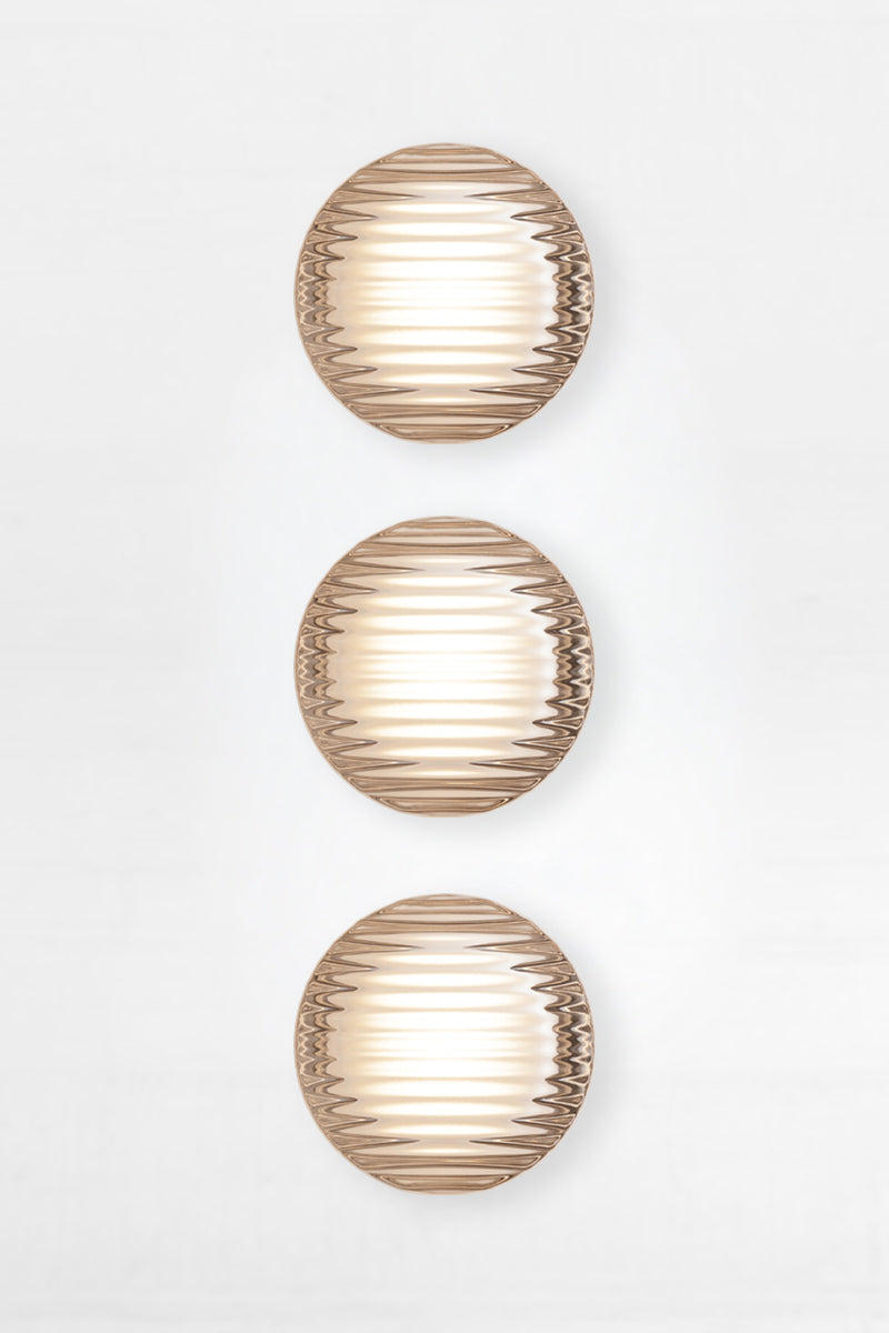 Triple frosted white Laval Dimple Glass LED Wall Sconce bundle with softly diffused LED light and vertically aligned ribbed glass shades.
