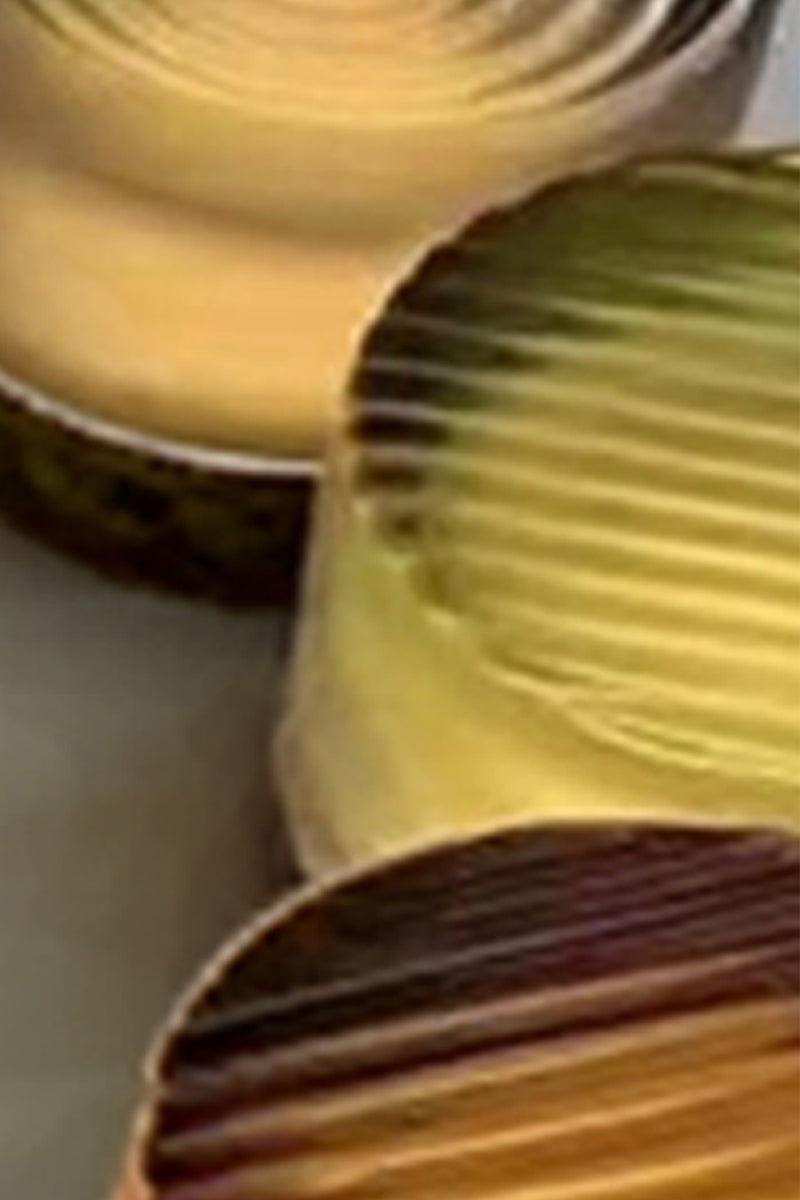 Saw tooth Laval wall light in green