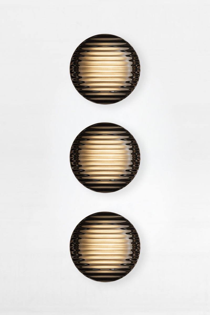 Triple smoked grey Laval Dimple Glass LED Wall Sconce bundle with vertically aligned ribbed glass shades and warm integrated LED illumination.