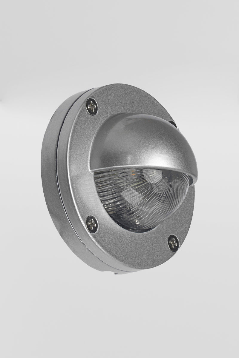 Silver finished eyelid step light, with LED light source and clear diffuser. 
