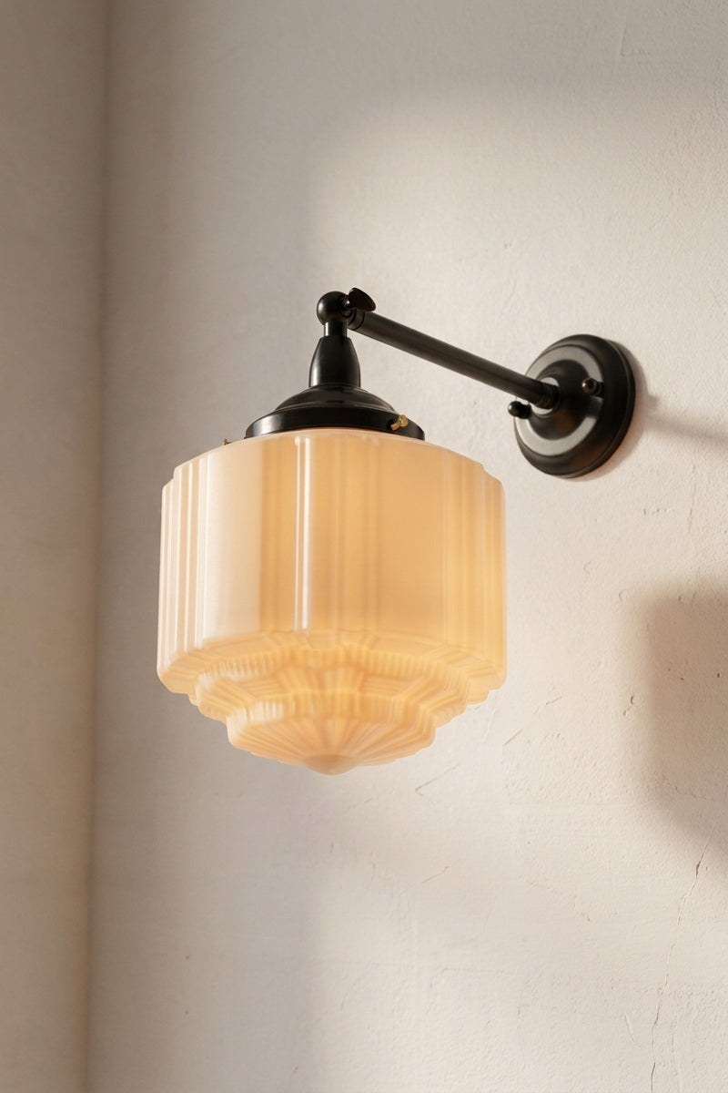 Deco Glass Exterior Wall Light with opal glass shade on angled black arm