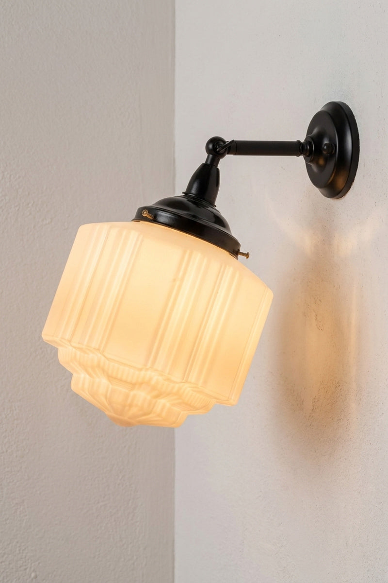 Deco Glass Exterior Wall Light with opal shade angled on adjustable short, black arm