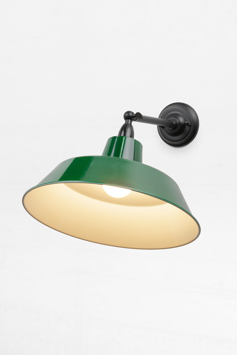 Long straight Arm outdoor wall sconce with a swivel lampholder and a Federation Green steel shade, showing the white inner. 