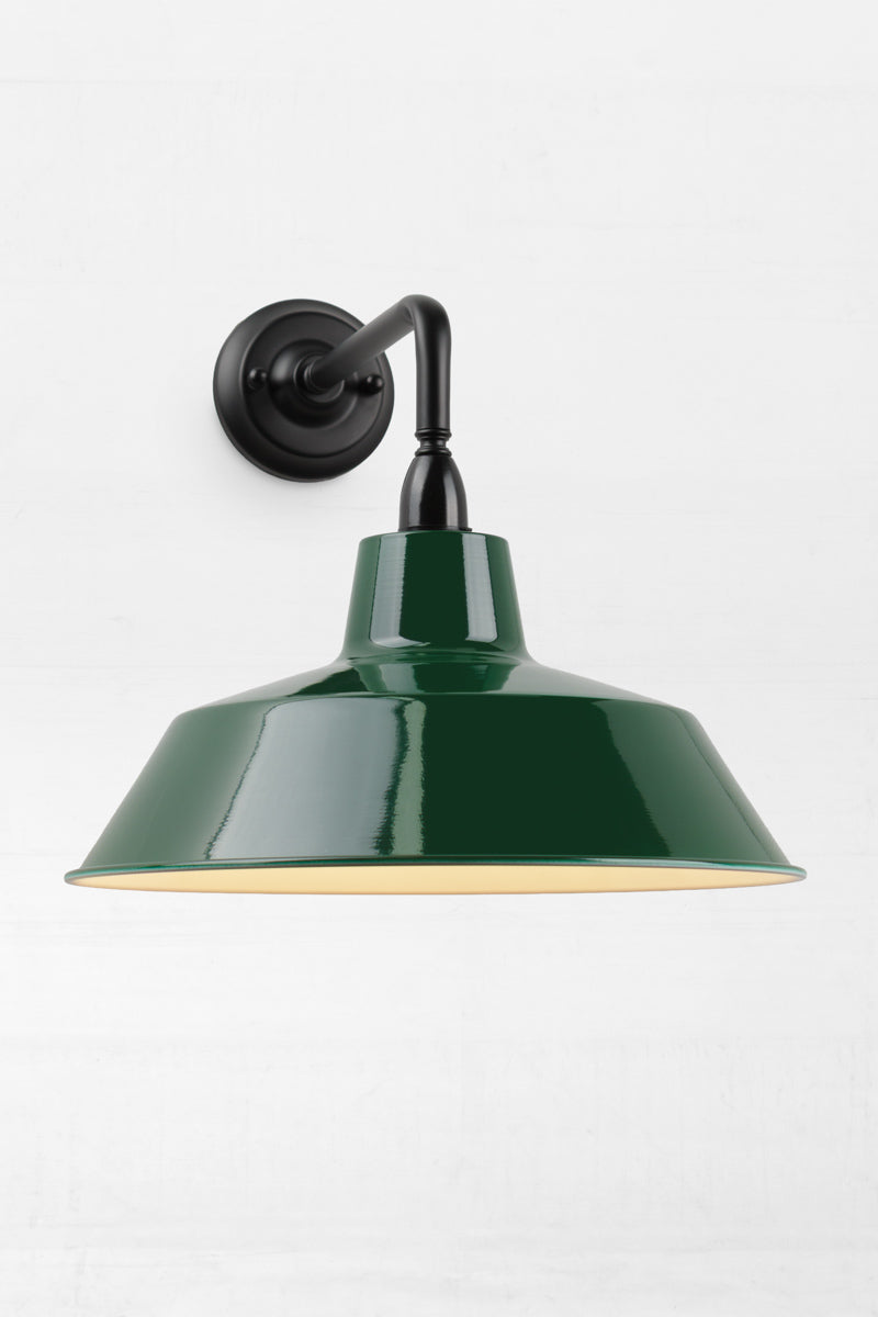 90 Degree outdoor wall sconce with a Federation green steel shade. 