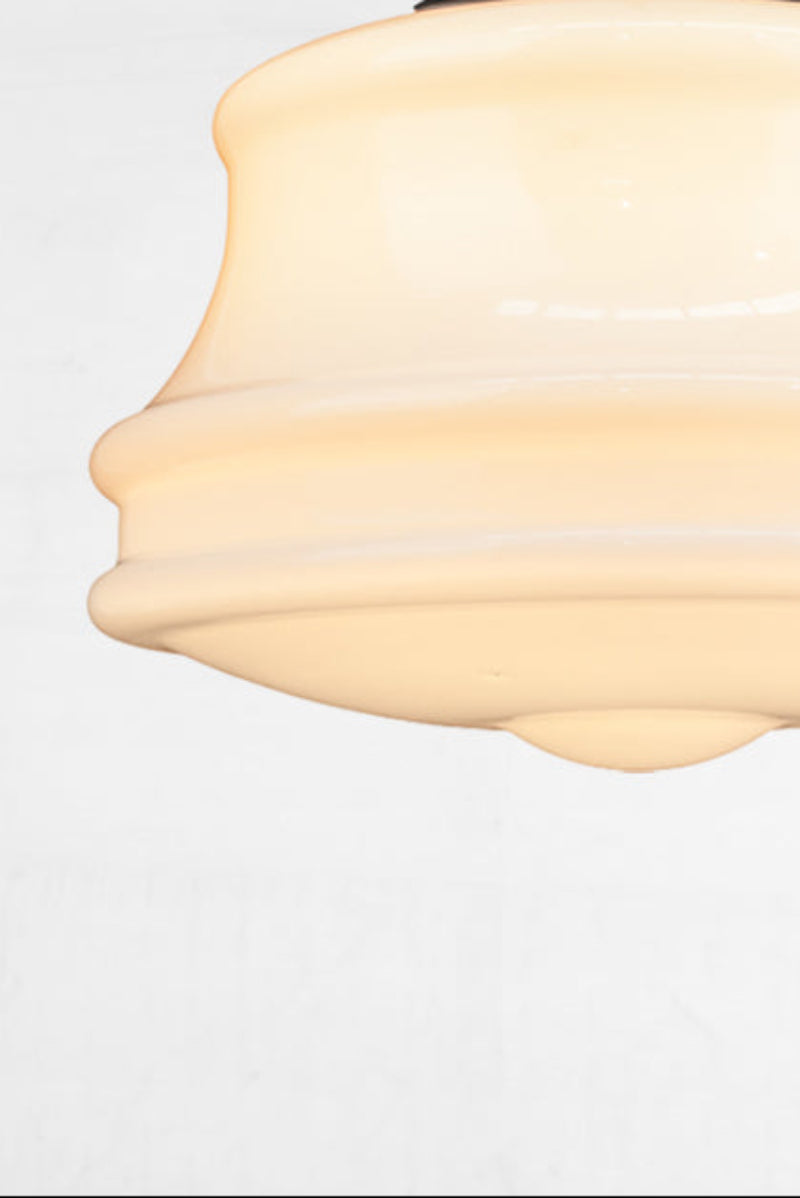 Classic glass light school house shade with an opal finish. 