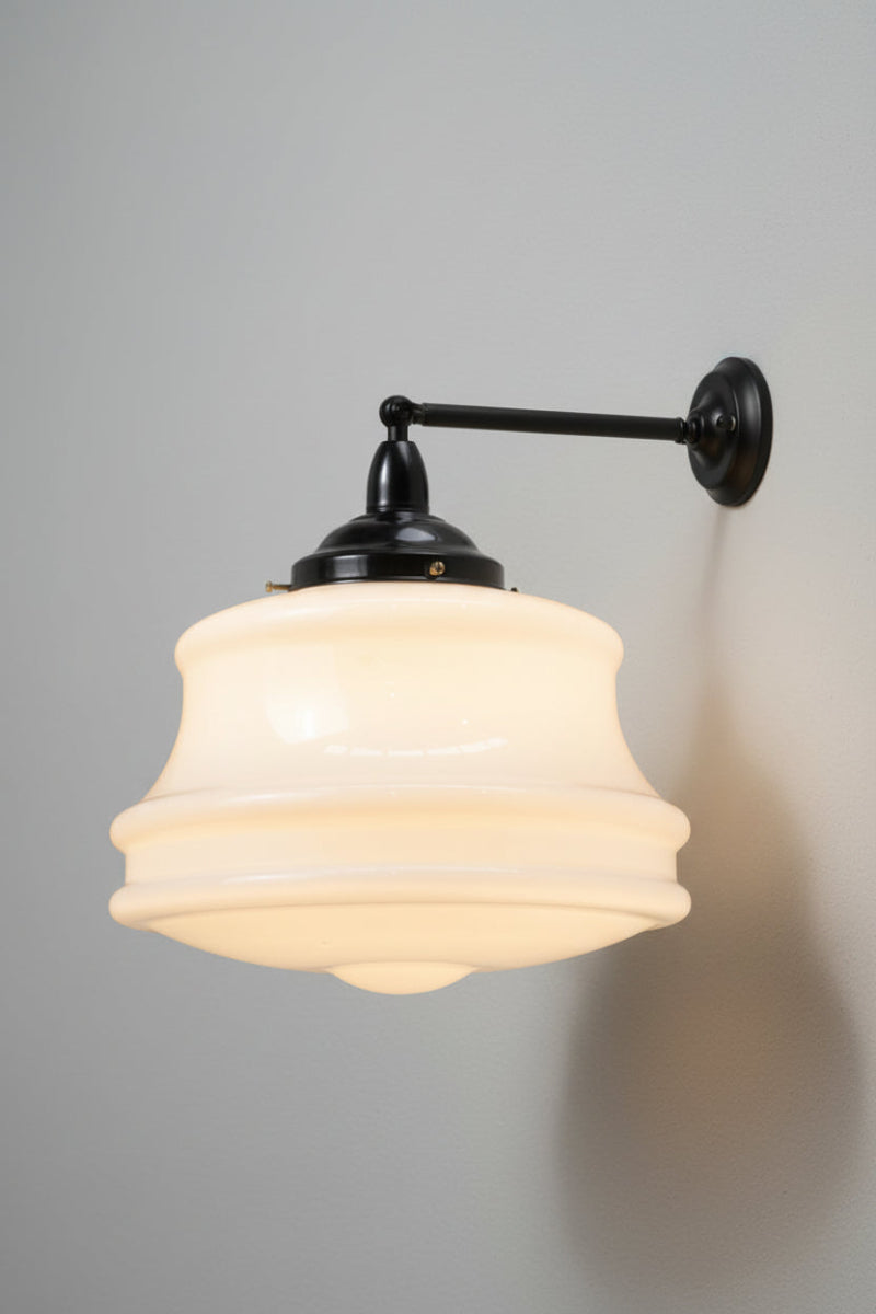 Large opal glass schoolhouse style shade on a black steel straight arm. 