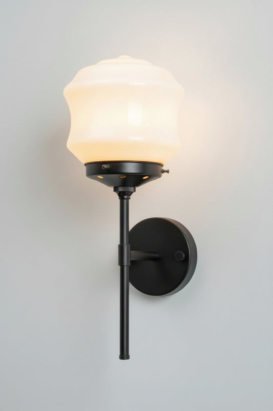 Black stem wall light with opal gass shade
