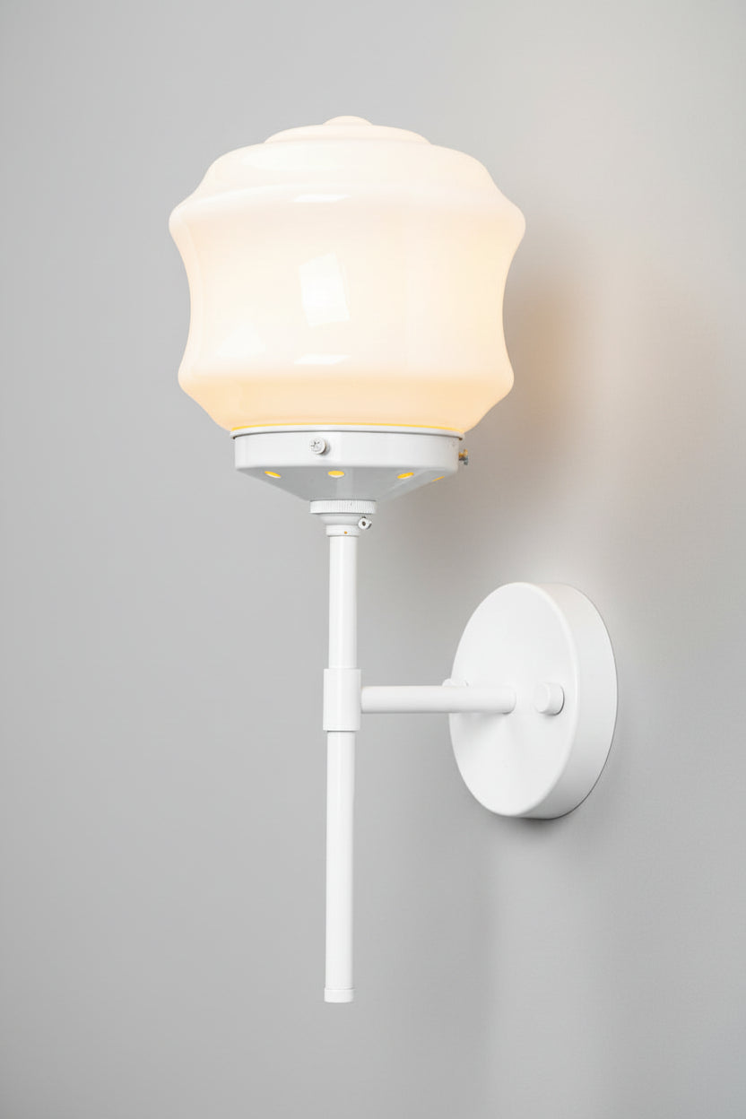 White stem wall light with an opal glass shade