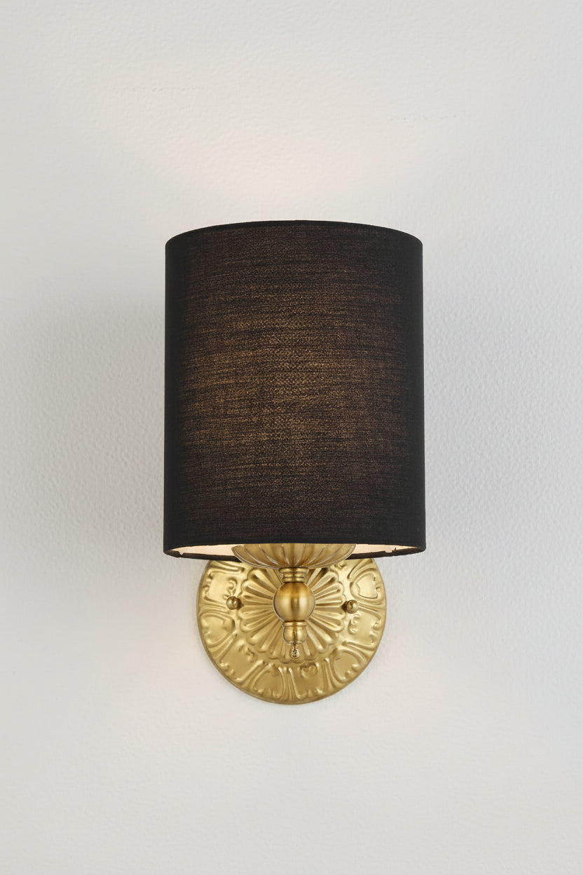 Front facing wall sconce with atin black shade and wntique gold sconce