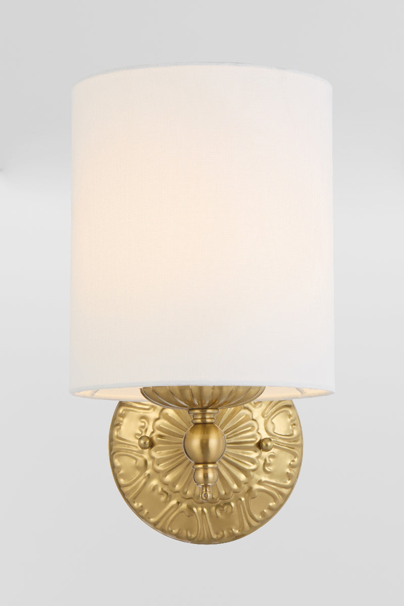 Front facing antique gold finished wall sconce with heritage detailing and a ivory satin shade.  