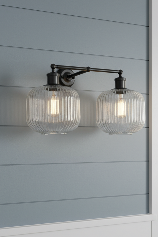 clear glass double arm wall light on coastal interior