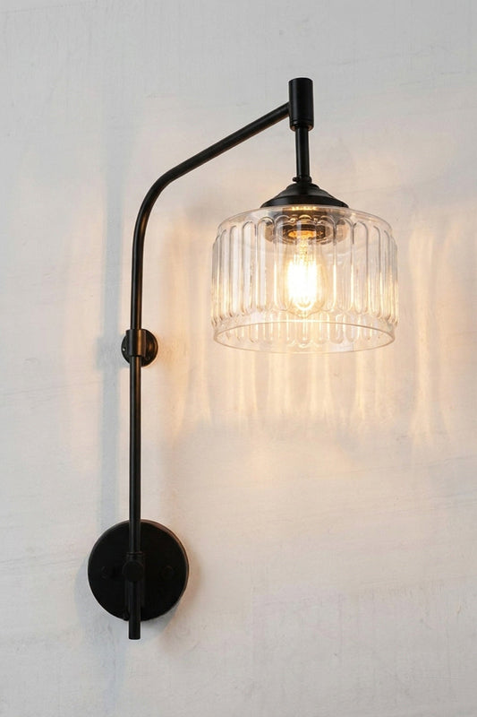 Capri Glass Wing Arm Wall Lamp with clear vertically fluted glass shade and matt black adjustable wall arm