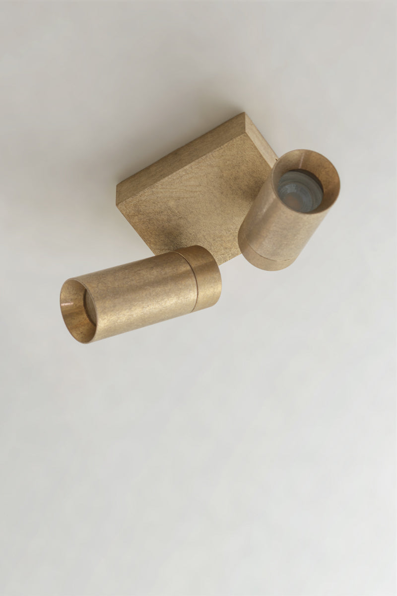 Close-up of a brass spotlights and IP65 fitting 