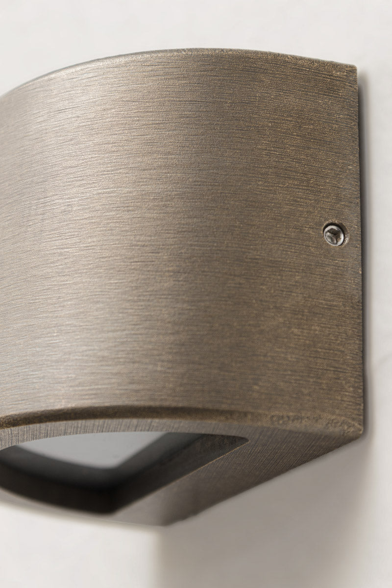 Age brass finish. Solid brass construction. The light can be mounted on steps and garden terrace walls.