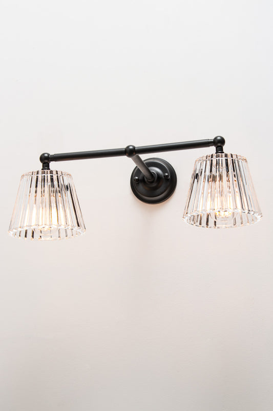 Black steel Davis Glass Double Swivel Arm Wall Light with two clear fluted glass shades