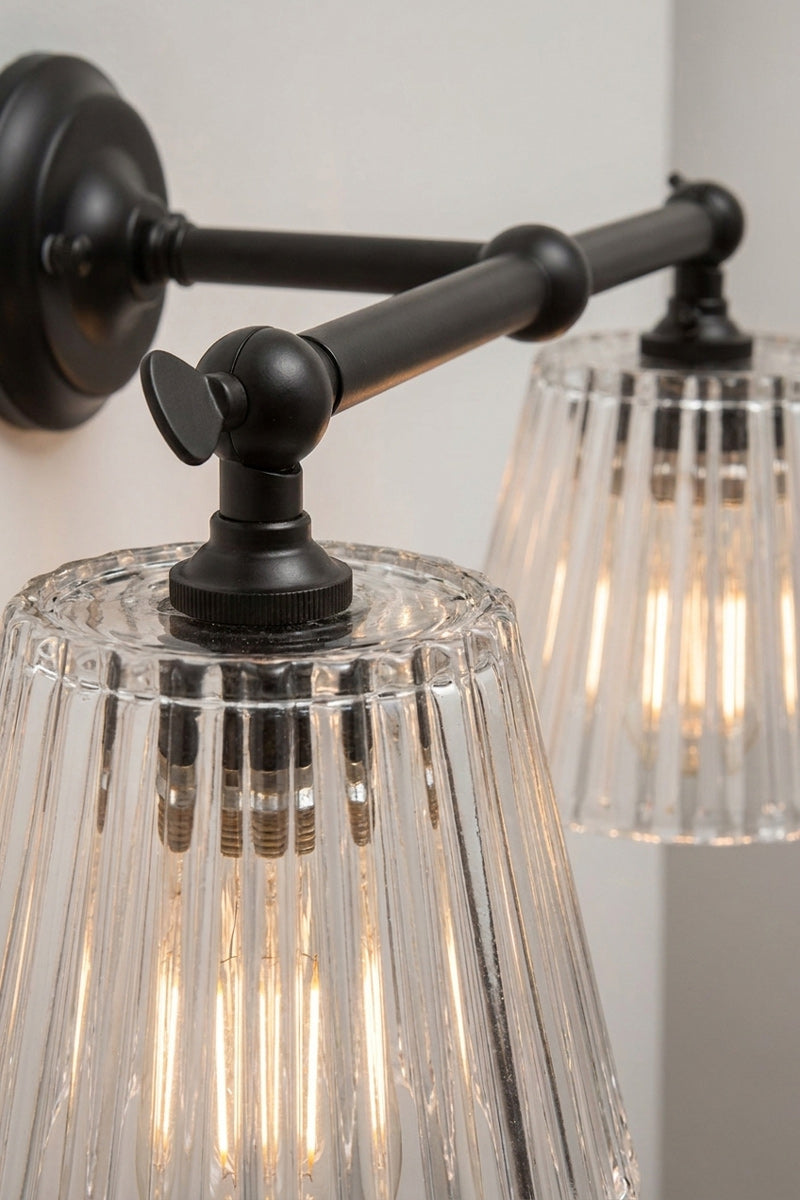 Close up of the black double wall arm fixture. 