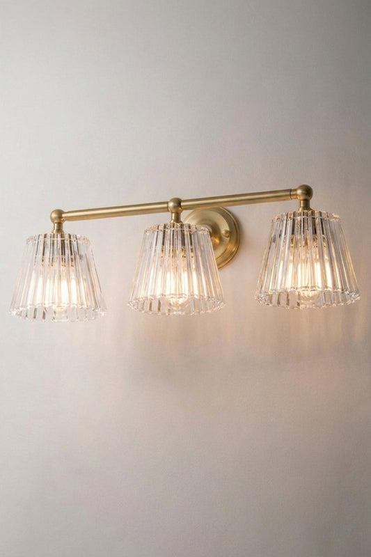 Gold/Brass Davis Glass Triple Swivel Arm Wall Light with three tapered clear fluted glass shades