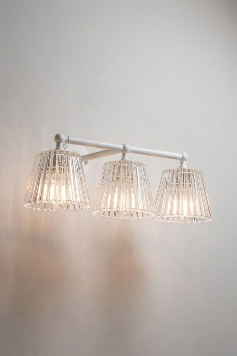 White Davis Glass Triple Swivel Arm Wall Light with three tapered clear fluted glass shades