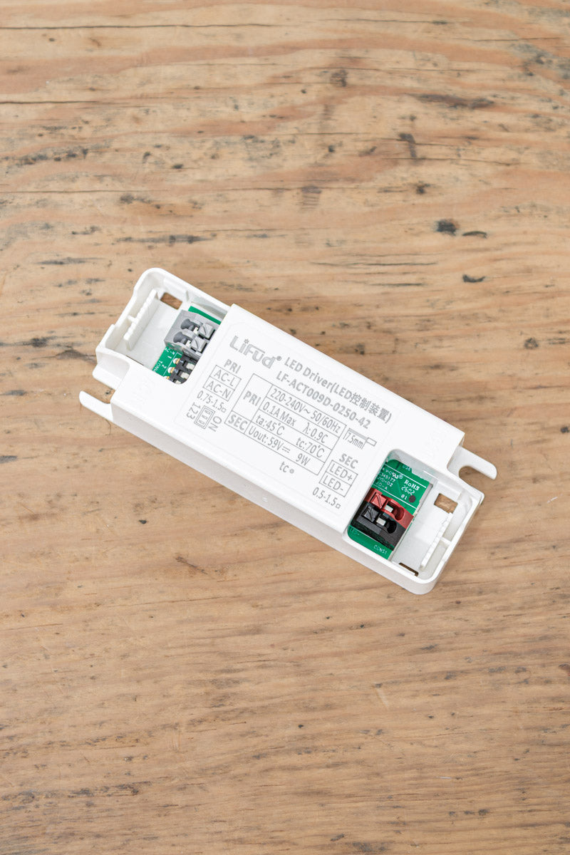 LED driver and electrical components supplied with the glass wall light fixture.