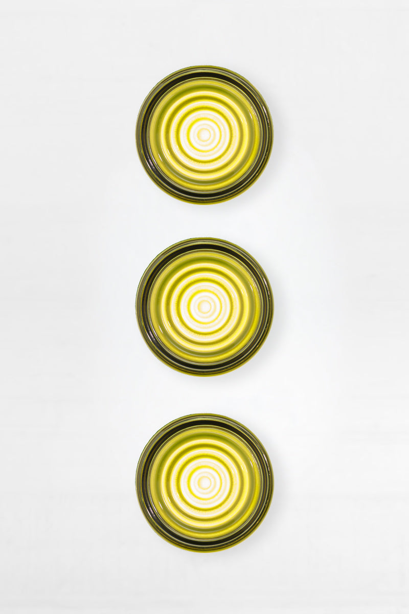 Bundle of three green LED glass wall lights shown front-on with illuminated ribbed glass detailing.