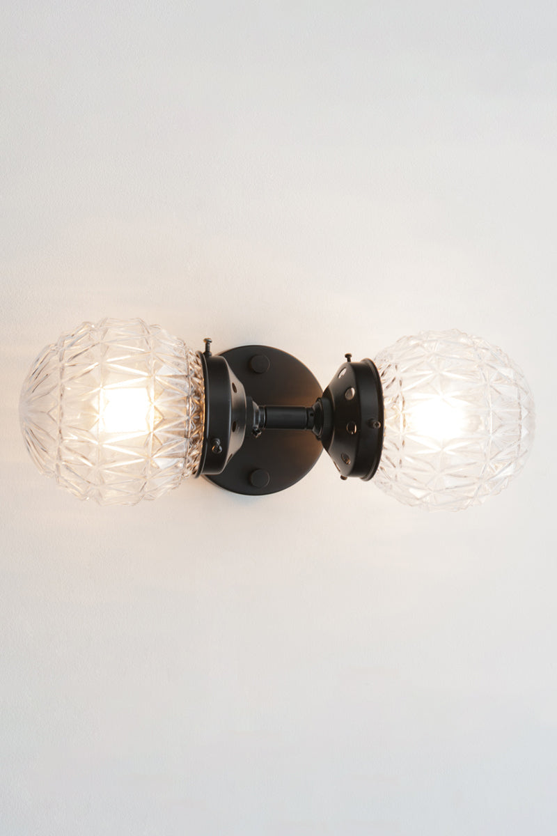 features two glass shade characterised by diamond cut points textured pattern on them.