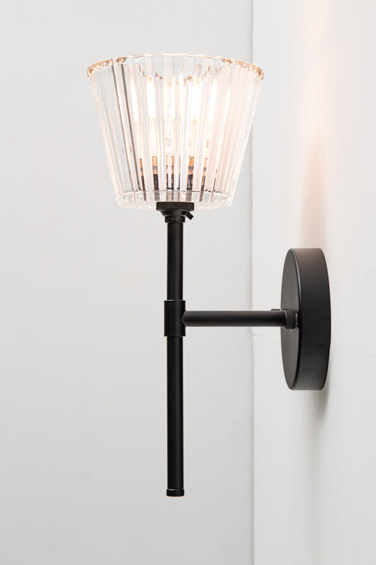 Side view of Davis Glass Stem Wall Light showing slim black stem and wall mount.