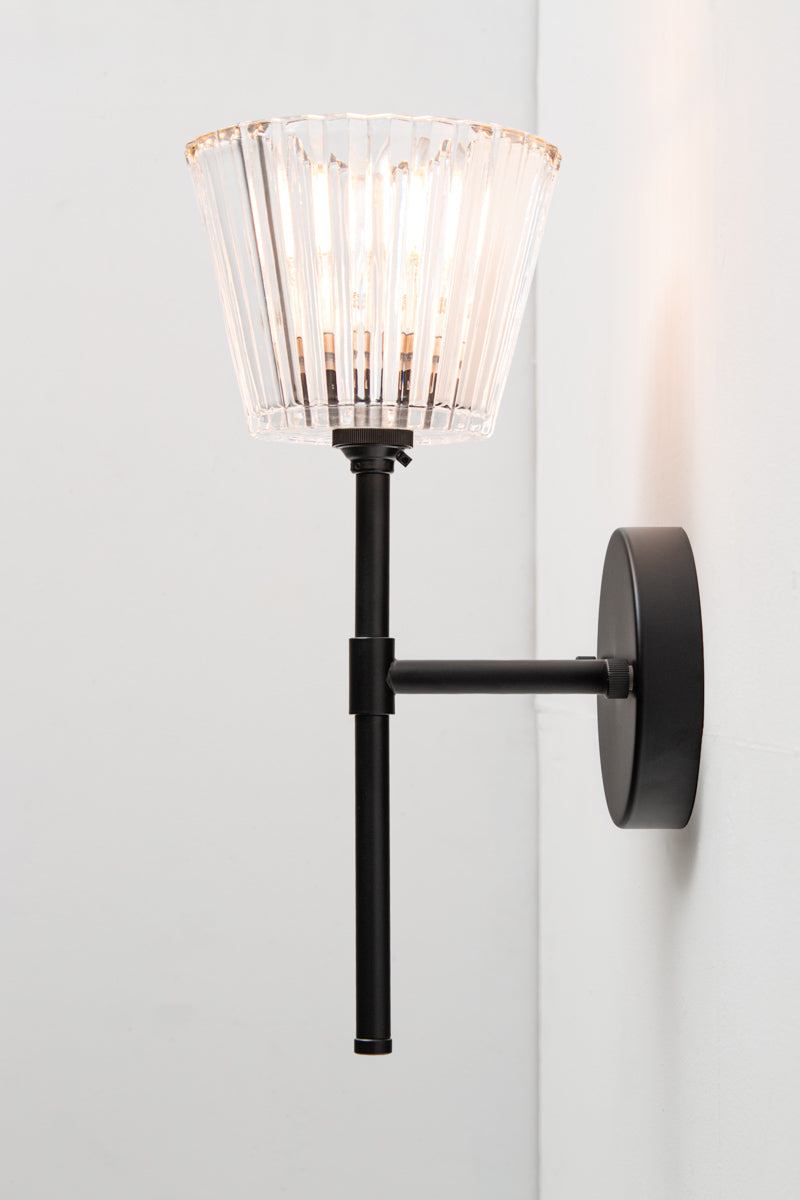 Side view of Davis Glass Stem Wall Light showing slim black stem and wall mount.