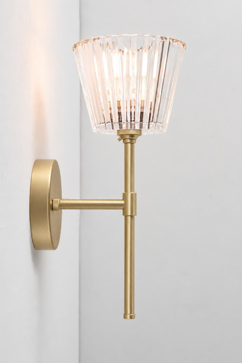 Side view of Davis Glass Stem Wall Light showing slim gold/brass stem and wall mount.