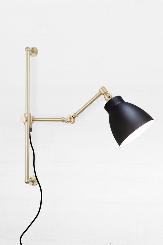gold brass arm with black shade