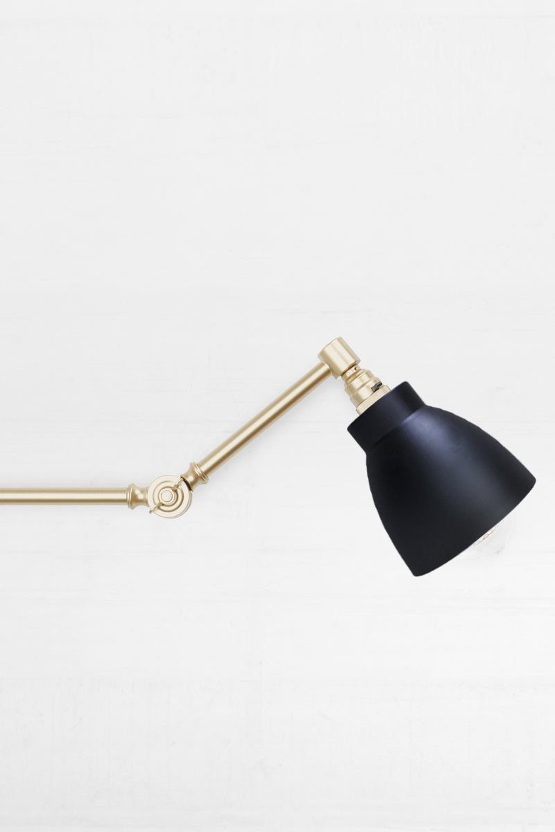 Gold brass adjustable arm with black shade 