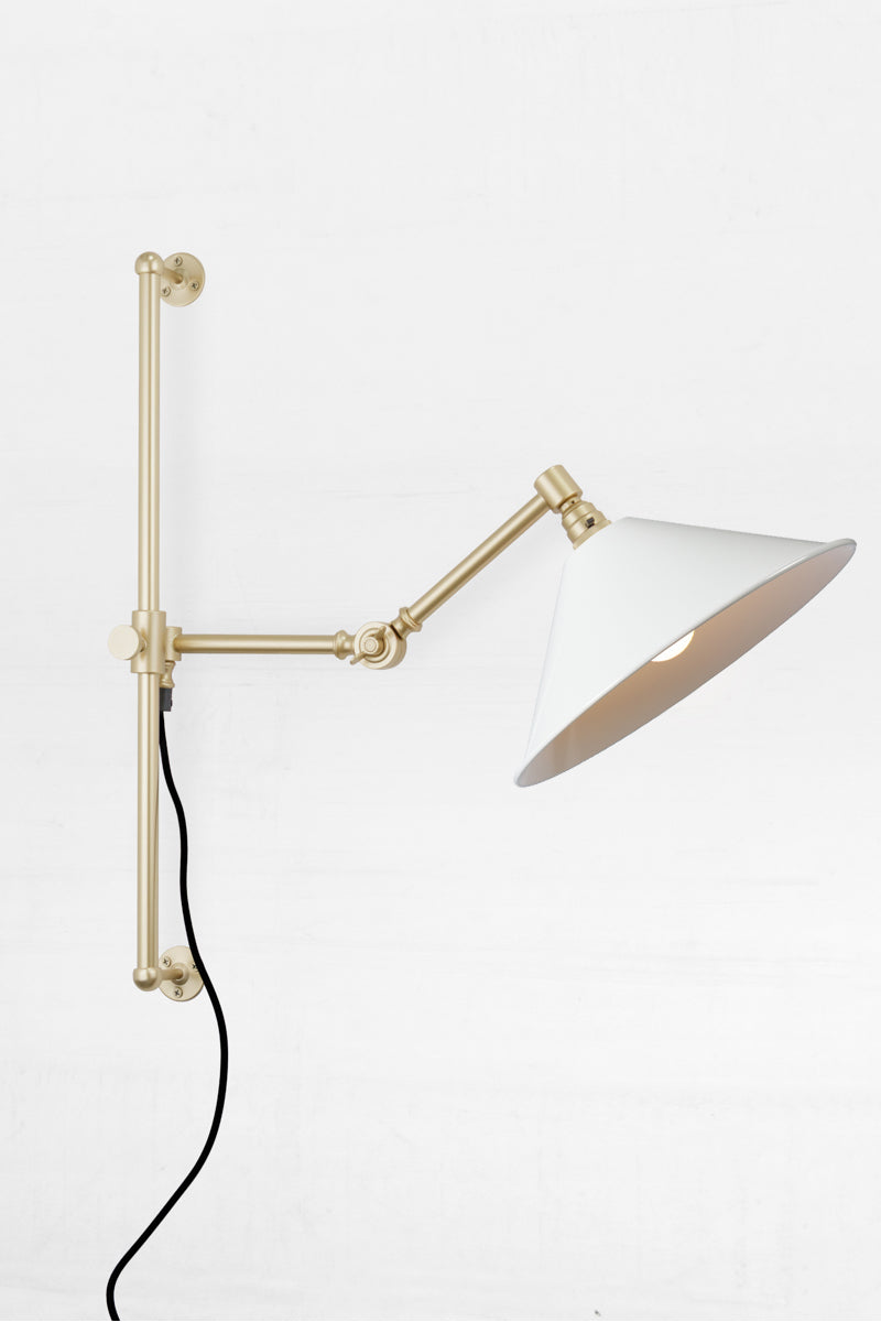 Large white shade with adjustable Swing Gold/Brass Arm with black cord and plug. 