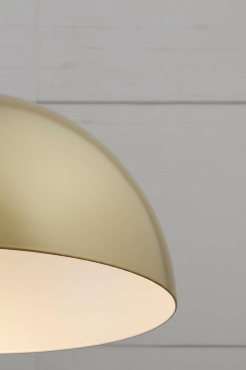 Small gold/brass shade with white inner