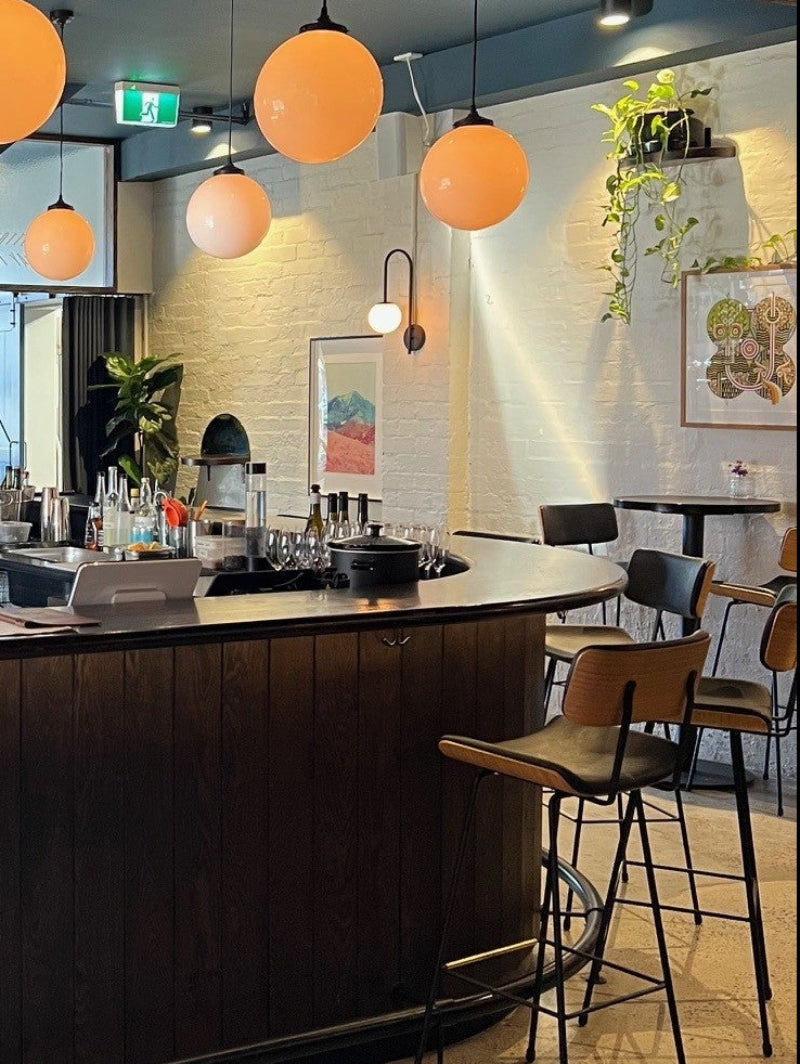 wall light with glass sphere at bar in Fitzroy Melbourne