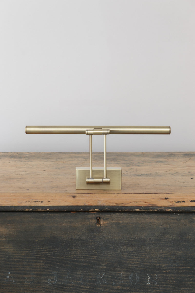 Top view of the uninstalled small brass picture light