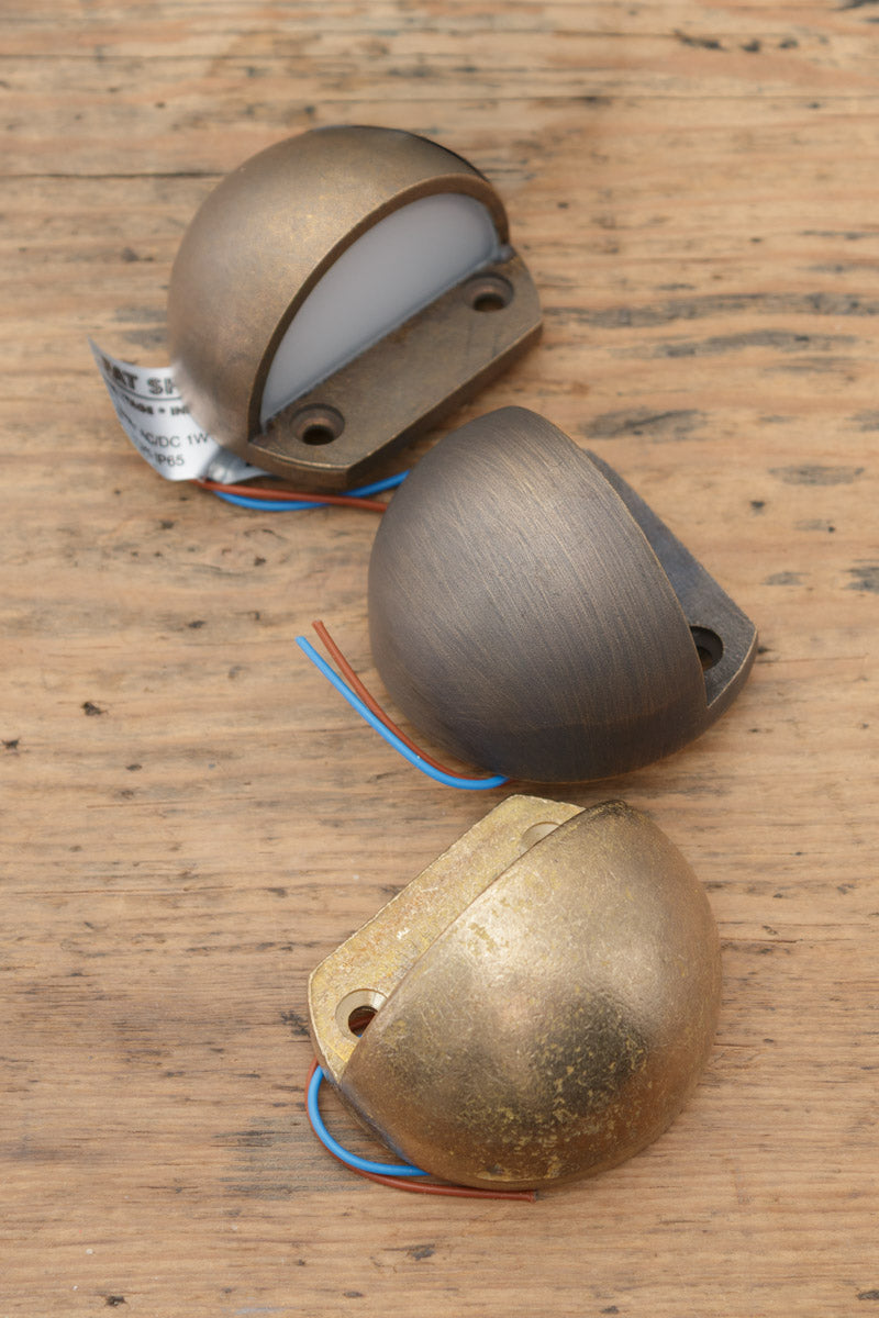 All three finishes of the small step brass lights. 