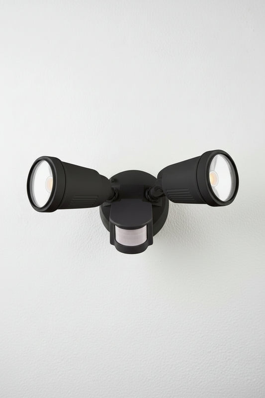 Front view of the Tulse Twin CCT LED Adjustable Sensor Floodlight in black with sensor