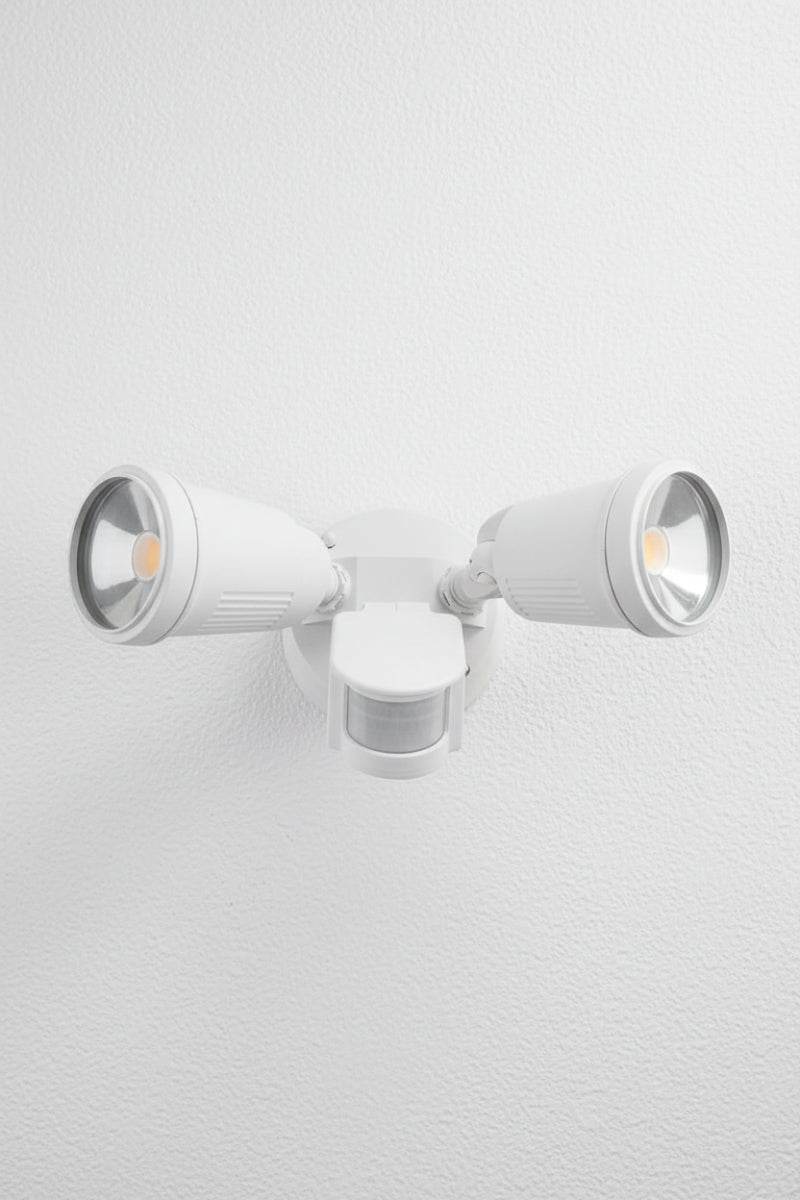 Front view of the Tulse Twin CCT LED Adjustable Sensor Floodlight in white with sensor