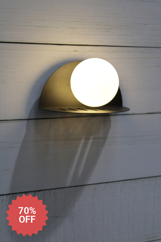 Metal 90 degree curved wall bracket in black with an opal glass ball shade. 